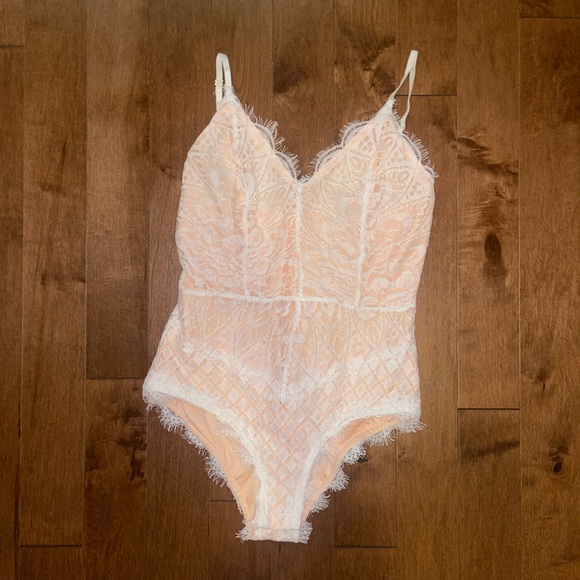 Boohoo Tops - Never worn. Boohoo medium bodysuit.